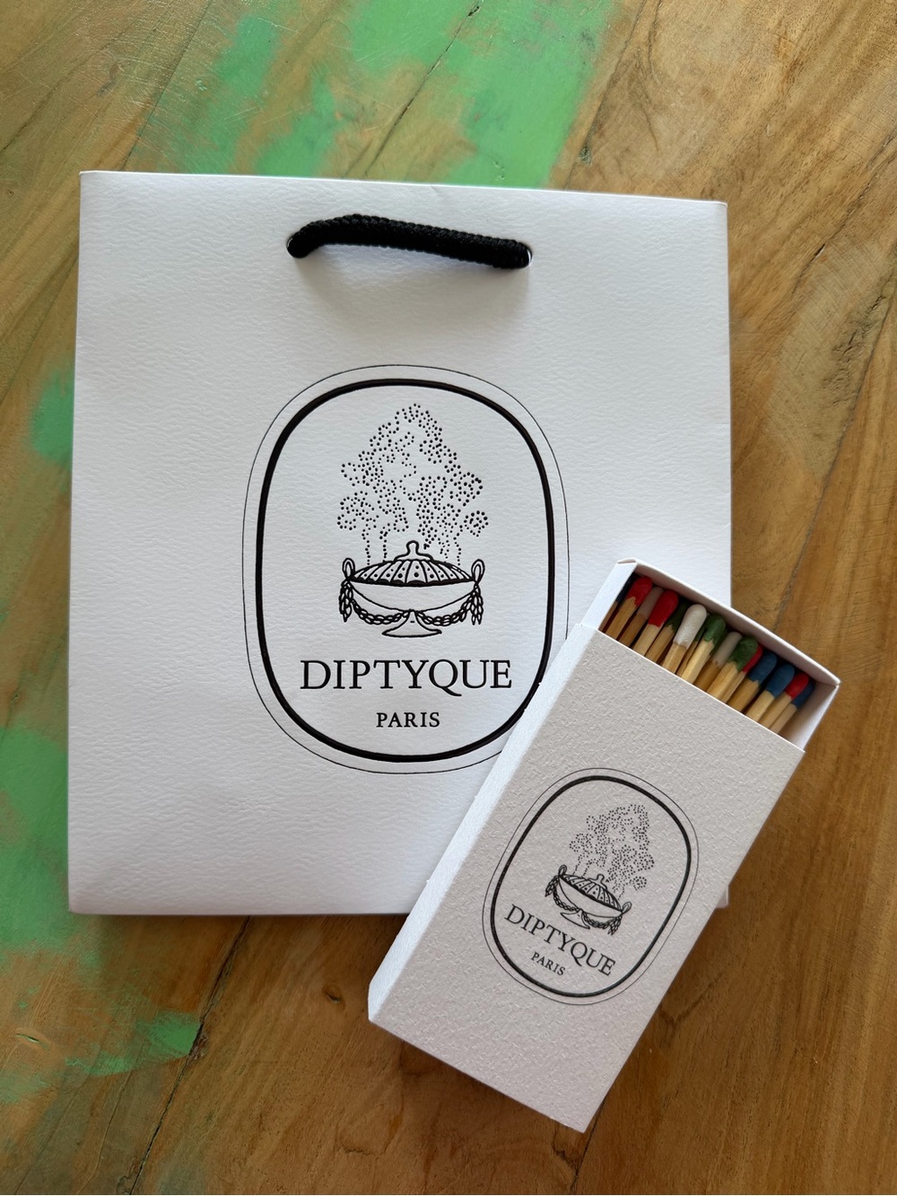 Diptyque White Matchbox with Multicolored Tips with a gift bag